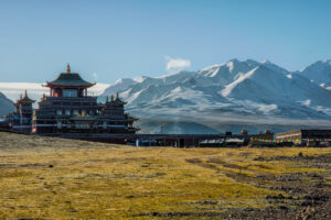 Black and White House Near Mountains Under Blue Sky muktinath